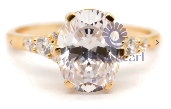 gold moissanite engagement ring