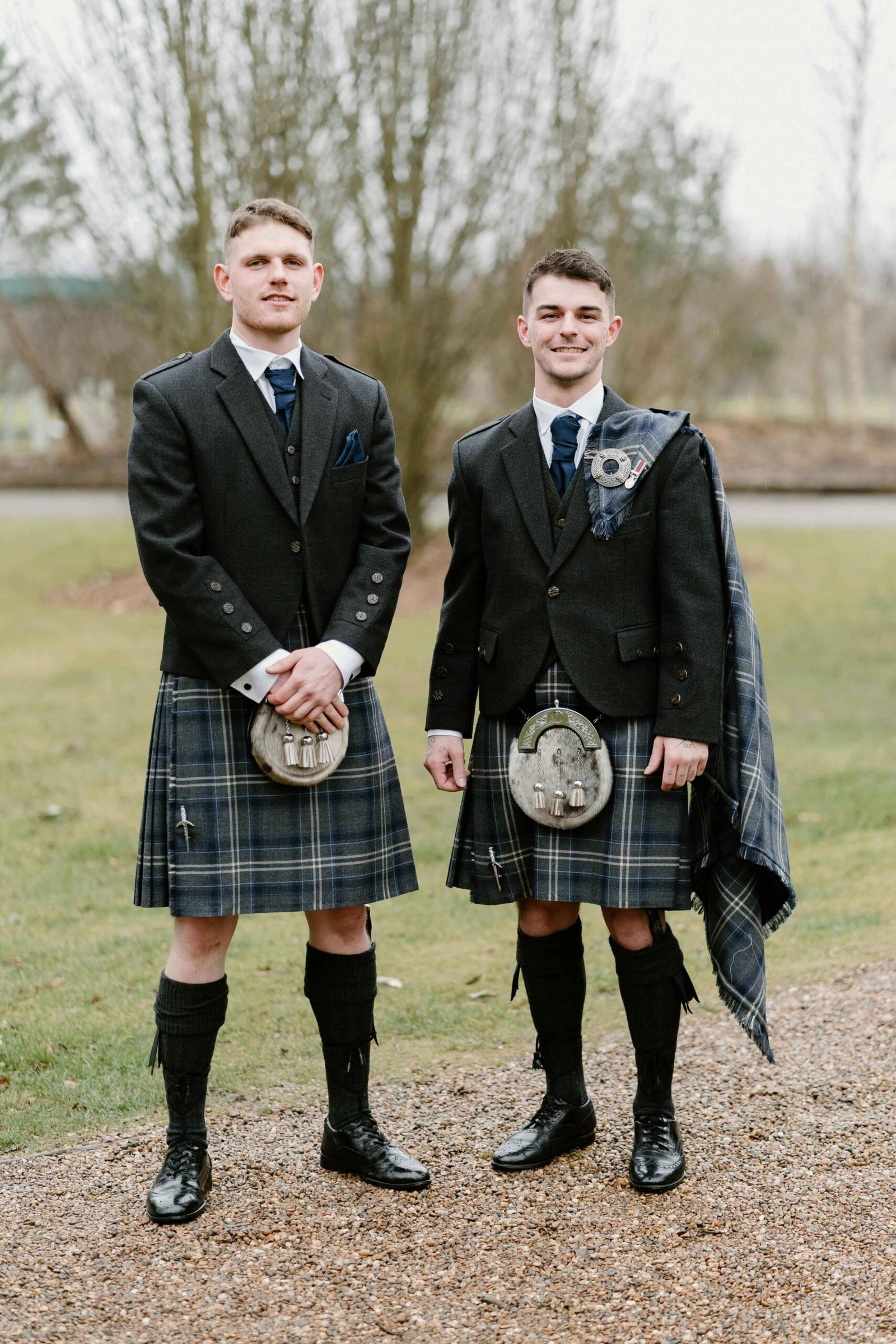 two men wearing Kilt Accessory