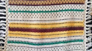 Knitted,Fabric,With,Stripes,Of,White,,Brown,,Yellow,,And,Green