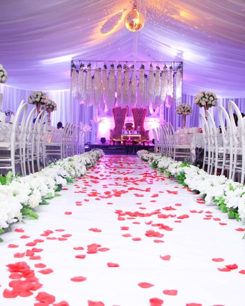 A beautifully decorated wedding chapel with elegant floral arrangements and soft lighting